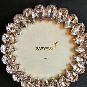 Papyrus 6" round picture frame with tear drop jewels on border. 4" opening.